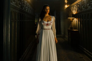 Nathalie Emmanuel in bloody dress in The Invitation