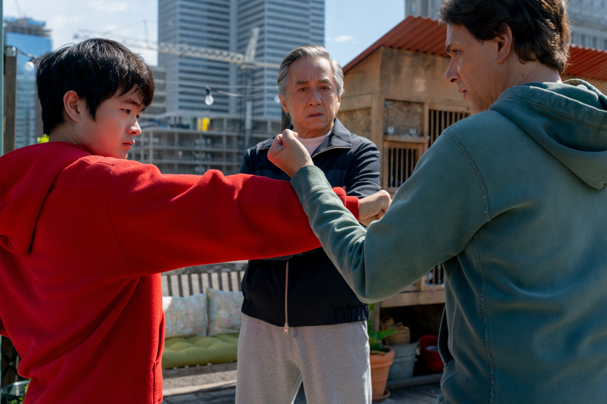 Ben Wang, Jackie Chan, and Ralph Macchio in Karate Kid: Legends