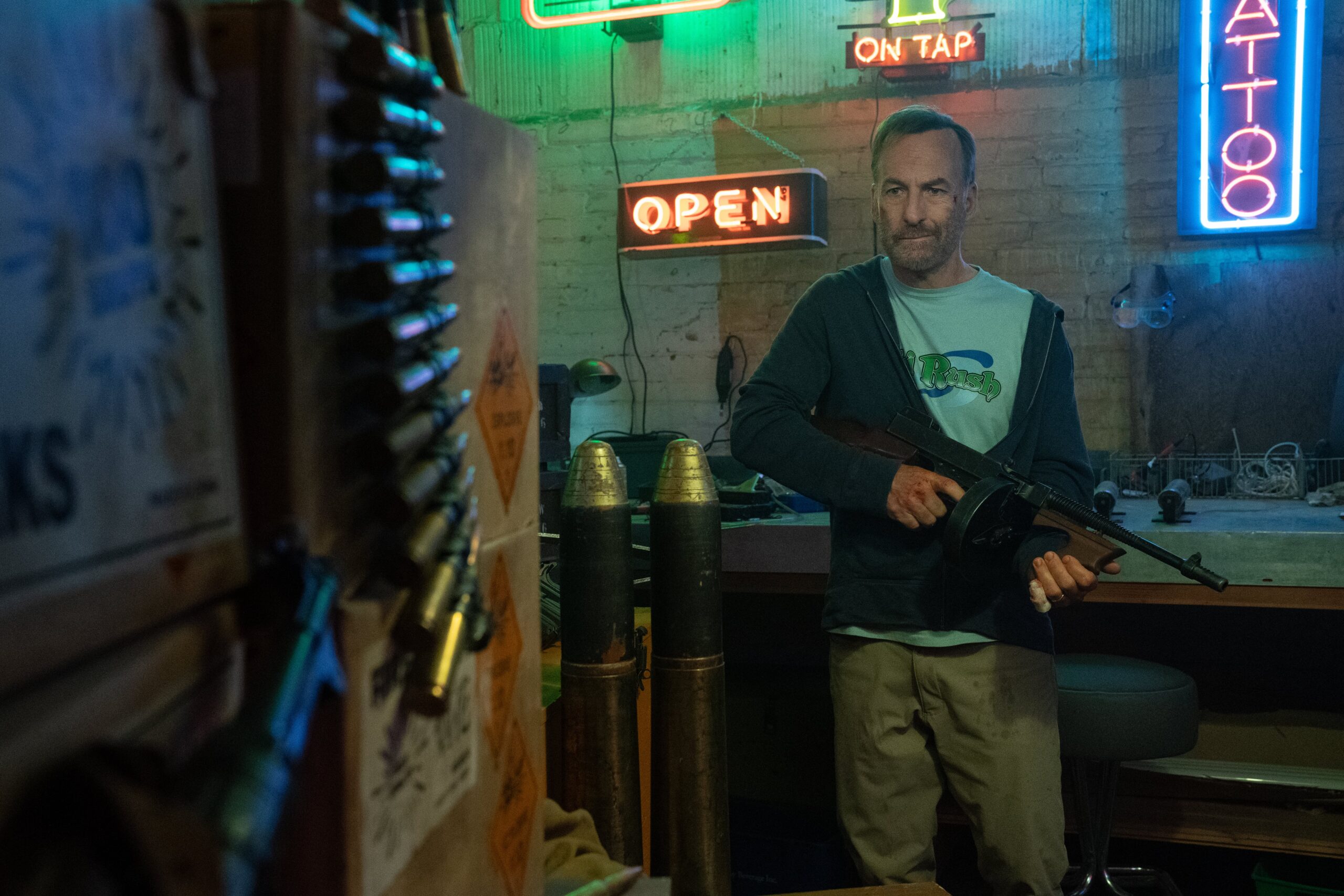 Hutch Mansell holding a gun in Nobody 2