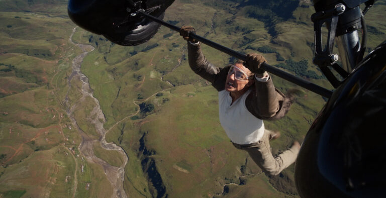 Tom Cruise hangs from a plane in Mission: Impossible The Final Reckoning