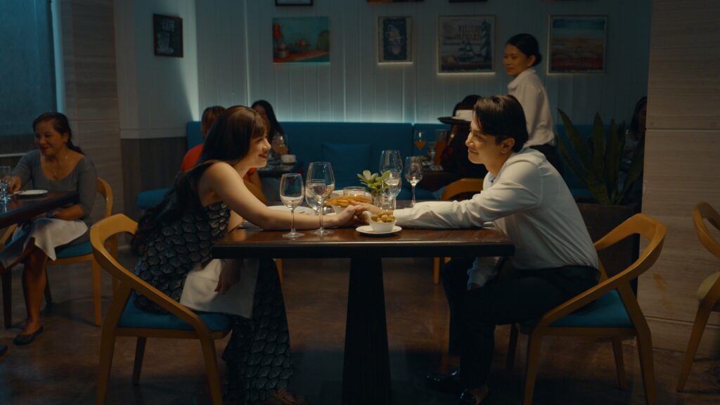 Debby and Gani having dinner in I Remember You