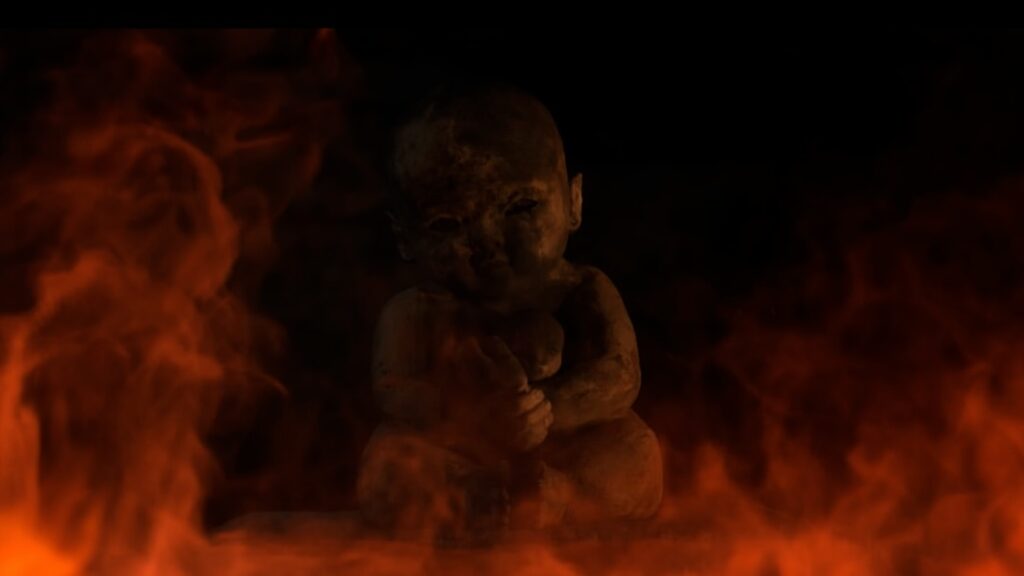 Mudborn evil clay doll