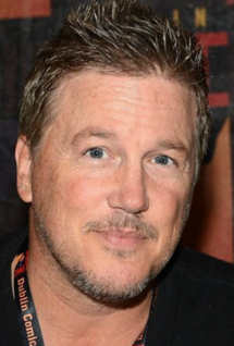 Lochlyn Munro as Greg Phillippe