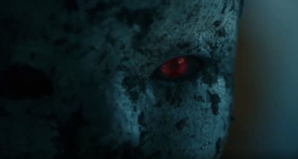 Clay doll's red eye in Mudborn movie