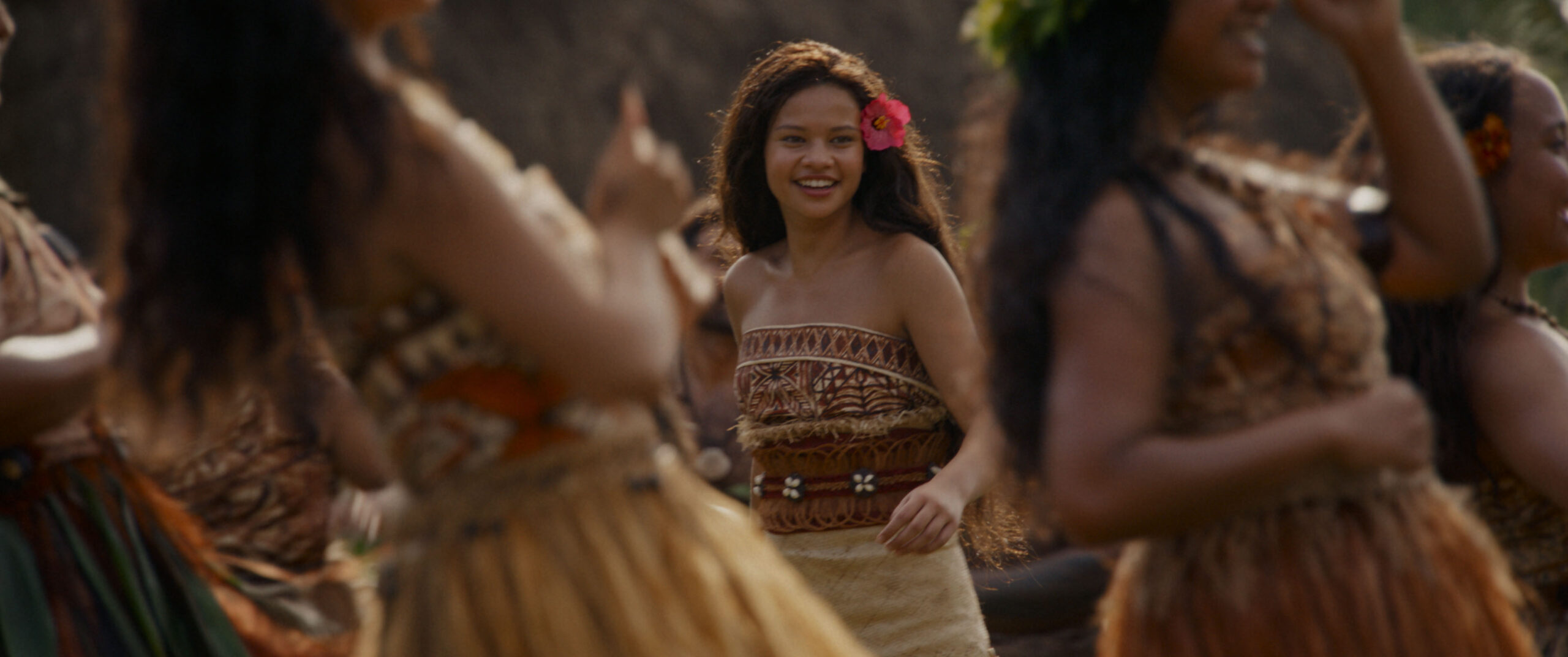 Moana with villagers in Motonui
