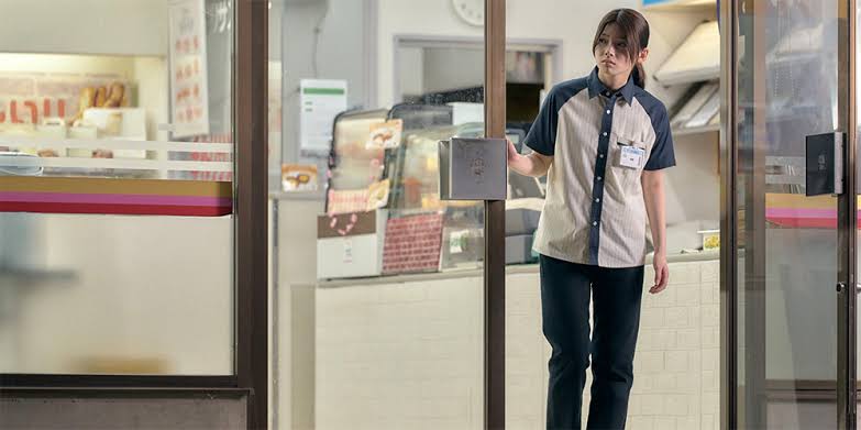 Girl in store entrance - The Convenience Store
